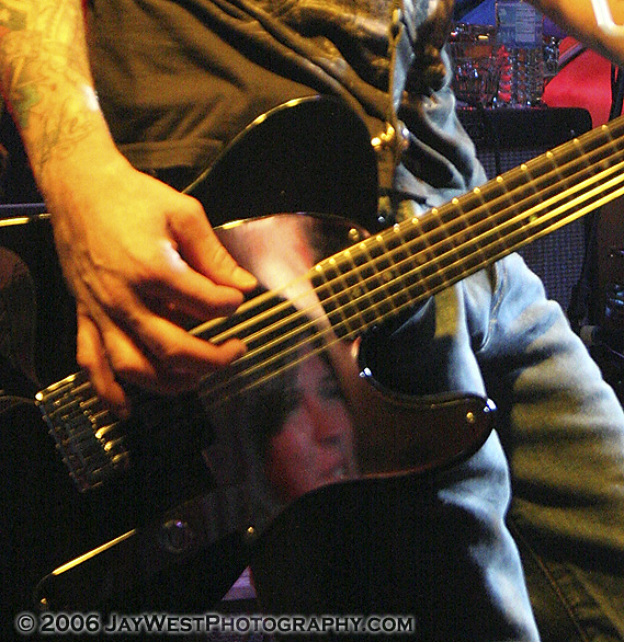 Girl from the front row caught in Jeremy Popoff of Lit's pick gaurd