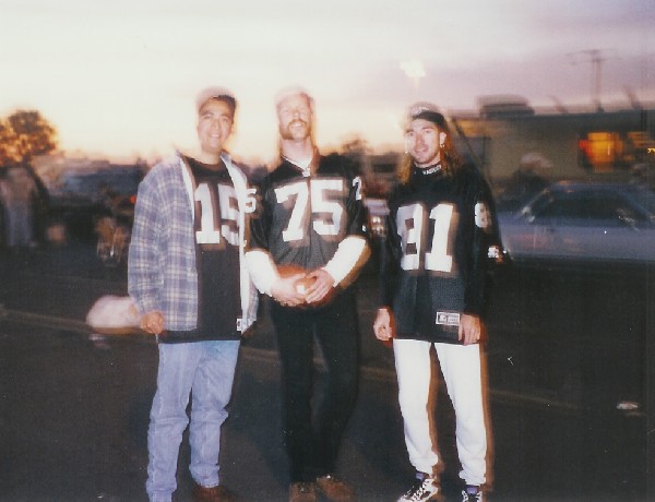 Super Shitty photo of my friend Jim, Me & Jaymz Hetfield of Metallica =